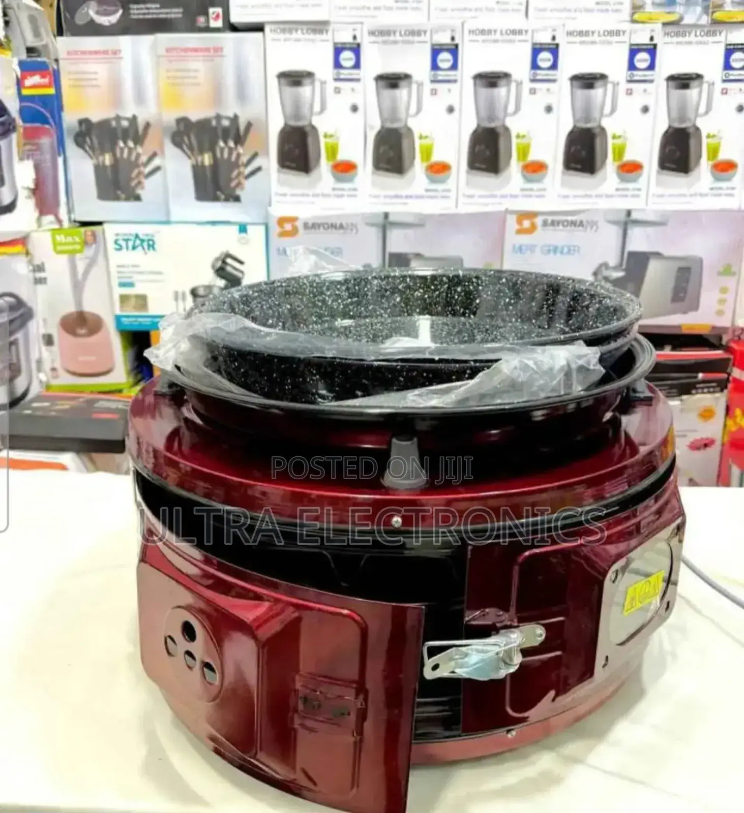Red Electric Round Oven, Also Known as a Turkish or Arabic Bread