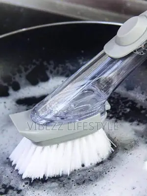 የሳሙና መያዣ ያለው የዕቃ ማጠቢያ ብሩሽ (Soap Dispensing Dish Brush)