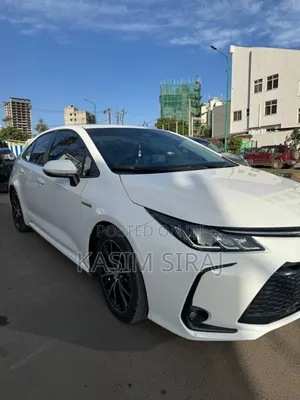 New Toyota Corolla Hybrid LE AWD 2024 White