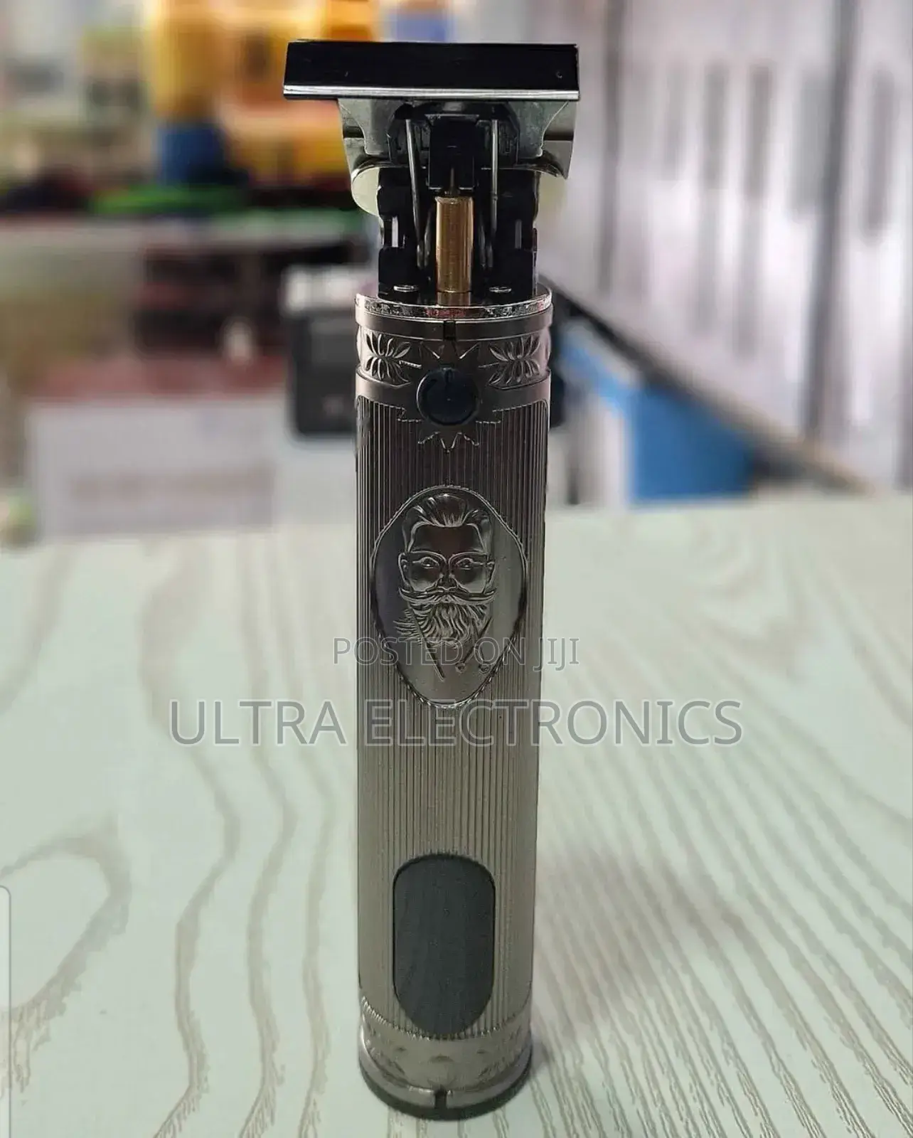 Kemei Km-700h or Km-700b Professional Hair Clipper in Gold.
