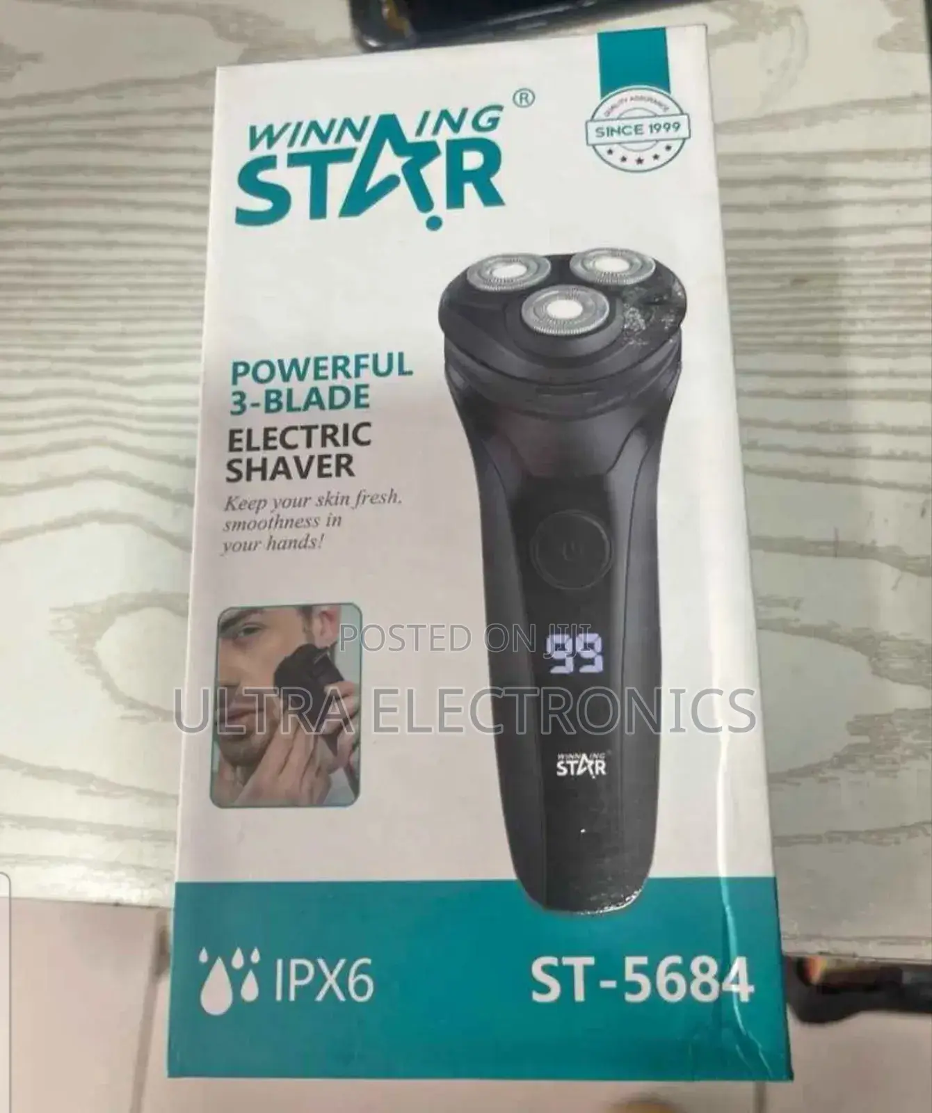 Winning Star St-5684 3-Blade Electric Shaver.