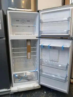 Orbit Top-Freezer Refrigerator, Specifically a 615-Liter Model