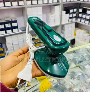 Portable Mini Electric Iron, a Compact Handheld Device Designed For