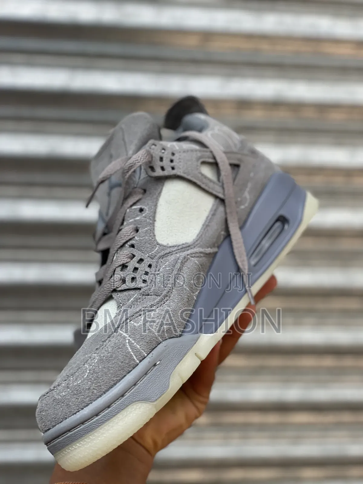 Air Jordan 4 Retro X Kaws "Cool Grey" Premium Sneakers