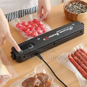 ላስቲክ ዉስጥ ያለዉን አየር ስቦ ማሸግ የሚችል Automatic Vacuum Sealer Machine