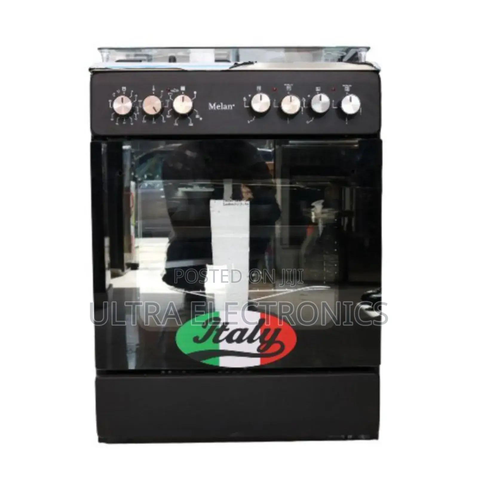 Melan Branded Freestanding Gas Cooker Featuring a Black Finish. 50/50