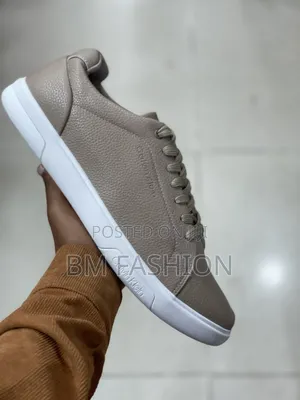 Calvin Klein in Beige: Clean and Classic