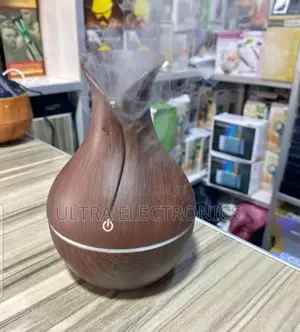 Humidifier With a Wood Grain Finish. Technology: Ultrasonic Cool Mist