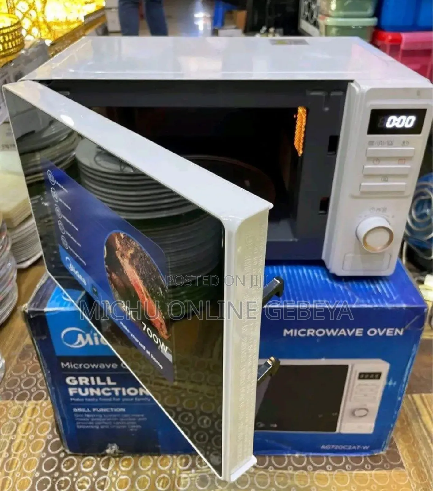 ገብቷል Midea Microwave Oven 20,23,25 Litters / Free Delivery
