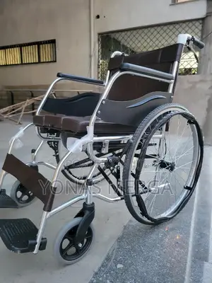 Key Features: Dual-Purpose Design: Wheelchair and Commode in One