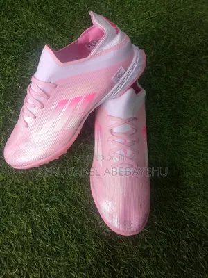 Football Boots (ታኬታ)