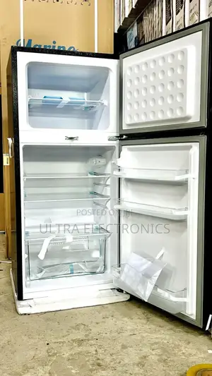 Iceland Brand Top-Freezer Refrigerator, Likely Model 210 or a Similar