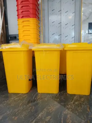 Garbage Yellow Industrial Wheeled Waste Container, Often as a Medical