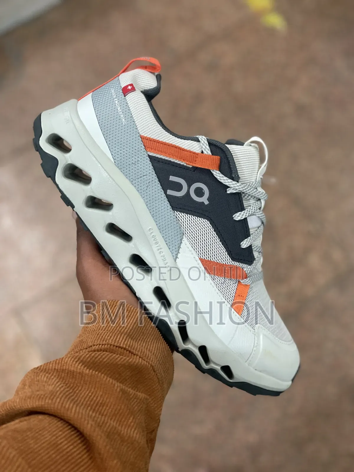 On Cloudsurfer Performance Sneakers: White/Orange Accents