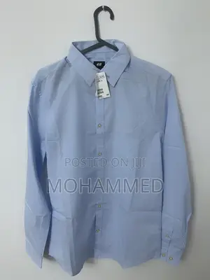 H M Light Blue Shirt ሽሚዝ