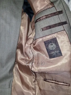 Caravelli Italy Three Button Suit
