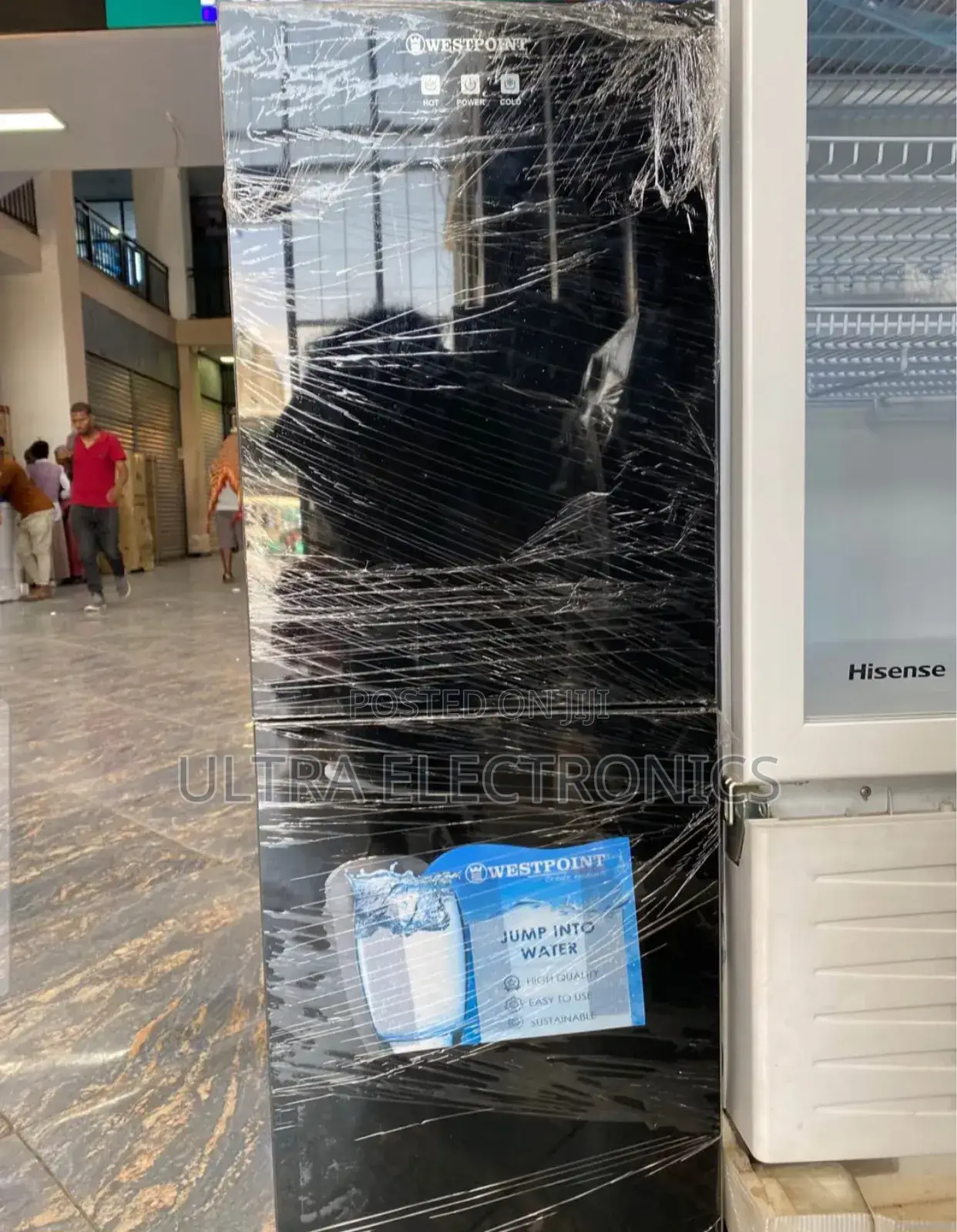 Westpoint Water Dispenser Featuring a Black Glass