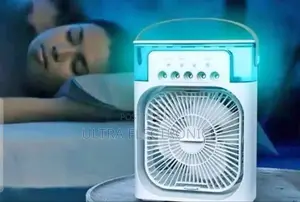 In-1 Portable Mini Evaporative Air Cooler, Humidifier, and Fan.