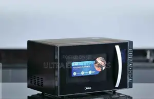 Midea Microwave Oven, Likely a 23l Model Featuring a Grill Function,
