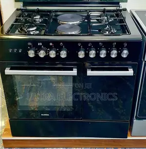 Kumtel 60x90 Freestanding Cooker Featuring Both Gas Burners