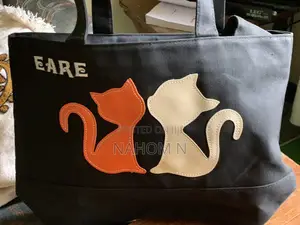 Black Canvas Tote Bag Features Decorative Cat-Shaped Appliques
