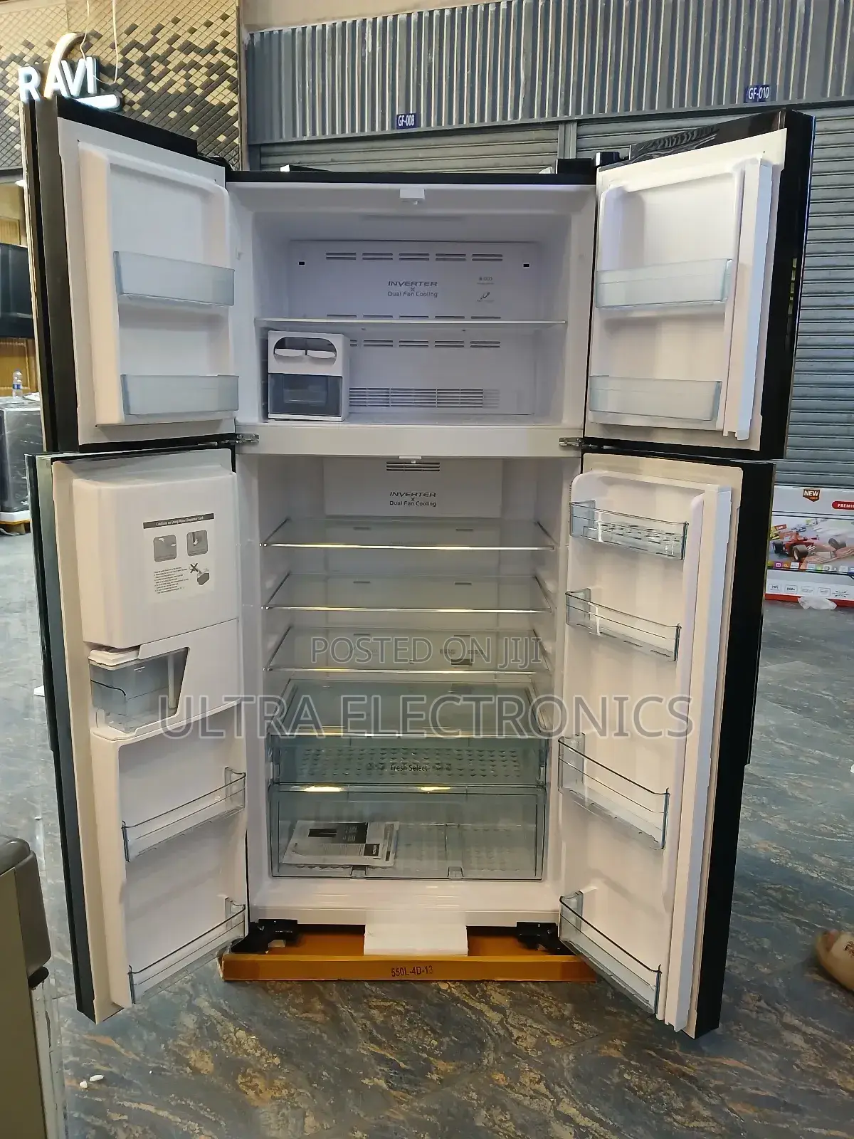 Hitachi 4-Door French Door Refrigerator Featuring a Sleek Black Glass
