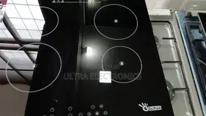 Stove Gelinjie Brand Induction Cooktop, Featuring a Sleek Black Glass