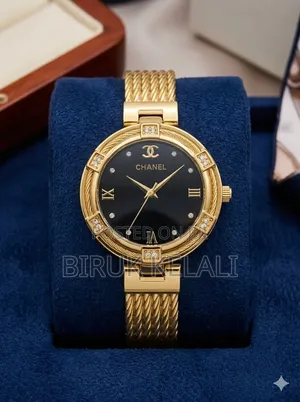 Chanel Women's Watch With a Gold-Toned Case and a Black Dial.