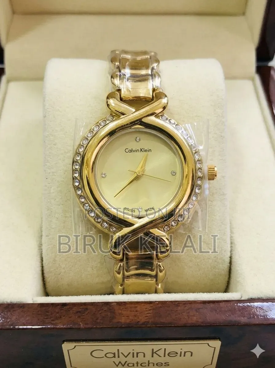 Calvin Klein Ladies' Watch, Specifically a Gold-Tone Crystal
