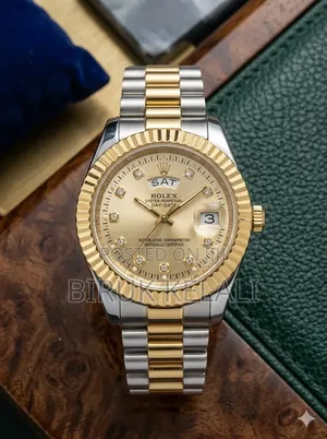 Rolex Oyster Perpetual Day-Date, Featuring a Champagne Dial