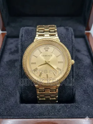Gold-Tone Women's Wristwatch by Versace, Likely From the v-Motif