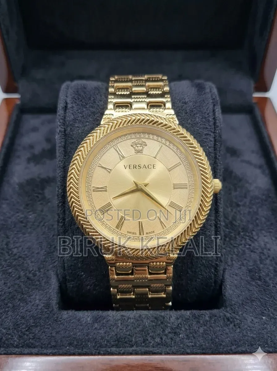 Gold-Tone Women's Wristwatch by Versace, Likely From the v-Motif