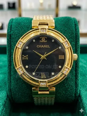 Chanel Watch With a Gold-Toned Case and a Black Dial