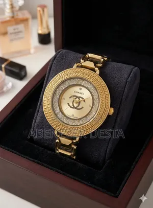 Gold-Toned Chanel Women's Watch Featuring a Chain-Style Bezel