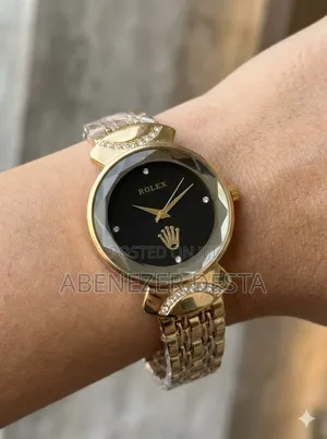 Gold-Toned Women's Quartz Watch Is Listed as a Rolex Model Black