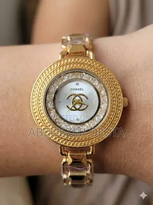 Gold-Toned Chanel- Style Ladies' Watch Featuring a Crystal- Embellishe