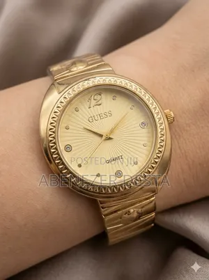 Guess Women's Analog Quartz Watch, Similar to The