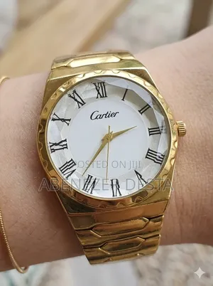 Gold-Colored Wristwatch From the Cartier Brand,
