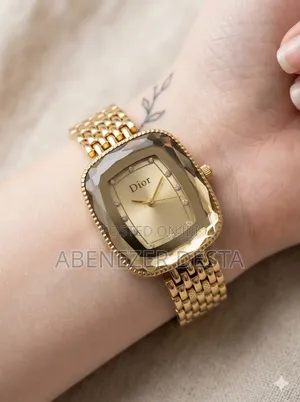 Gold-Colored Dior Women's Watch Features an Analog Display a Stylish