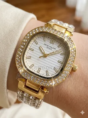 Patek Philippe Nautilus Golden by White Diamond Design