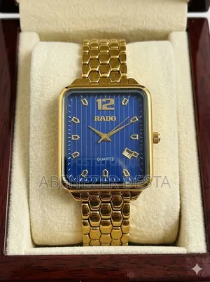 Gold-Tone Rado Quartz Watch Featuring a Blue Dial With Diamond-Style