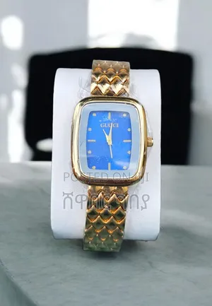 Elegant Gucci Women's Gold Watch Blue Dial