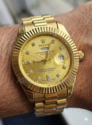 Rolex Day-Date Style Wristwatch, Commonly Found as a Gold-Tone Quartz