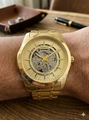 Gold-Toned Tissot Automatic Men's Watch Features a Skeleton Dial And