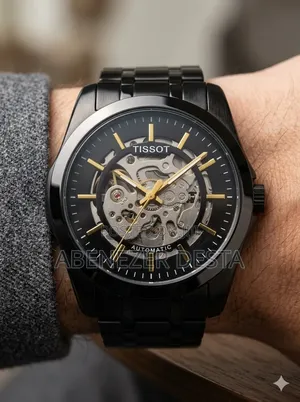Tissot Automatic Skeleton Watch, Featured in a Black and Gold Color