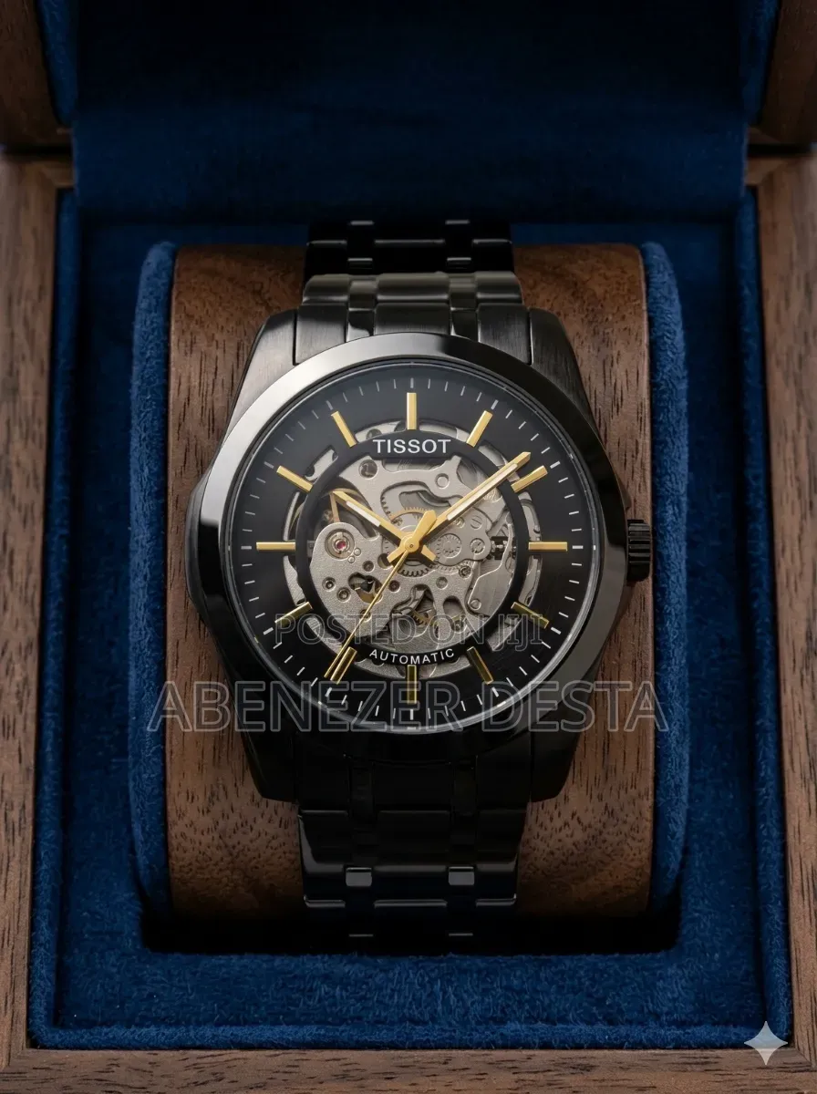Tissot Automatic Skeleton Watch, Featured in a Black and Gold Color