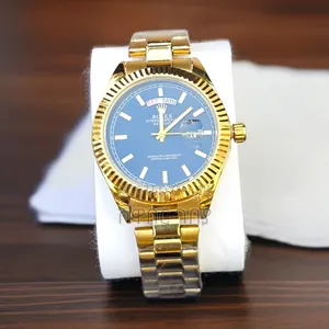 ​Graduation Milestone: Gold Rolex Deep Blue Dial Fluted Bezel