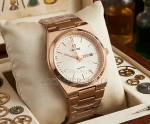Tevise Gold-Toned Stainless Steel Quartz Wristwatch.