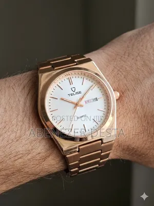 Tevise Gold-Toned Stainless Steel Quartz Wristwatch.