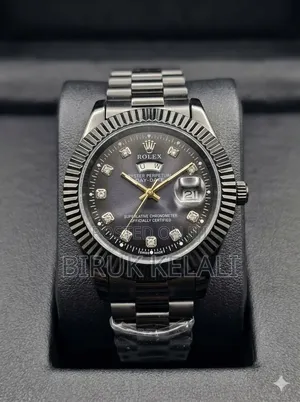 Black Stainless Steel Rolex Day-Date Wristwatch With a Fluted Bezel